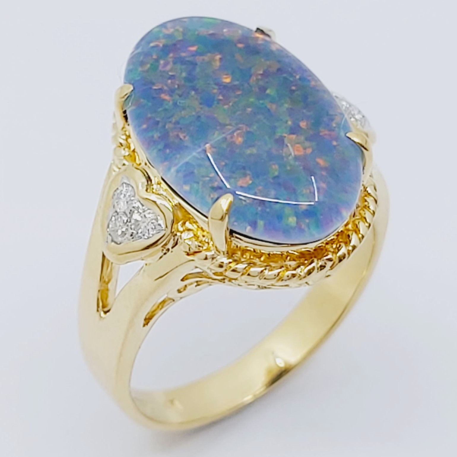 Ring 750/- mit einer Opal-Triplette und Brillanten, Größe: 51, 6,350g