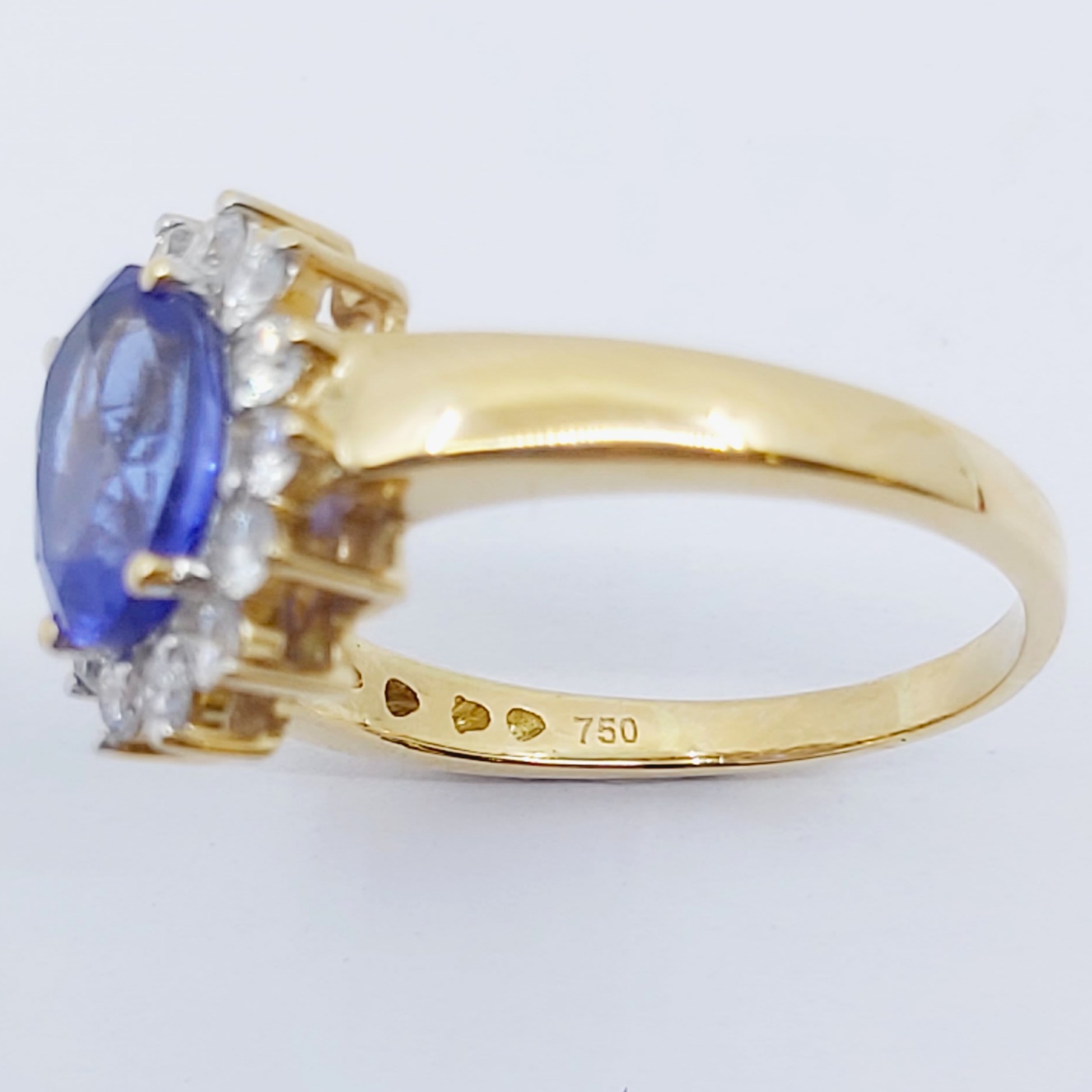 Ring 750/- mit einem Tansanit und Brillanten, Größe: 58, 4,94g