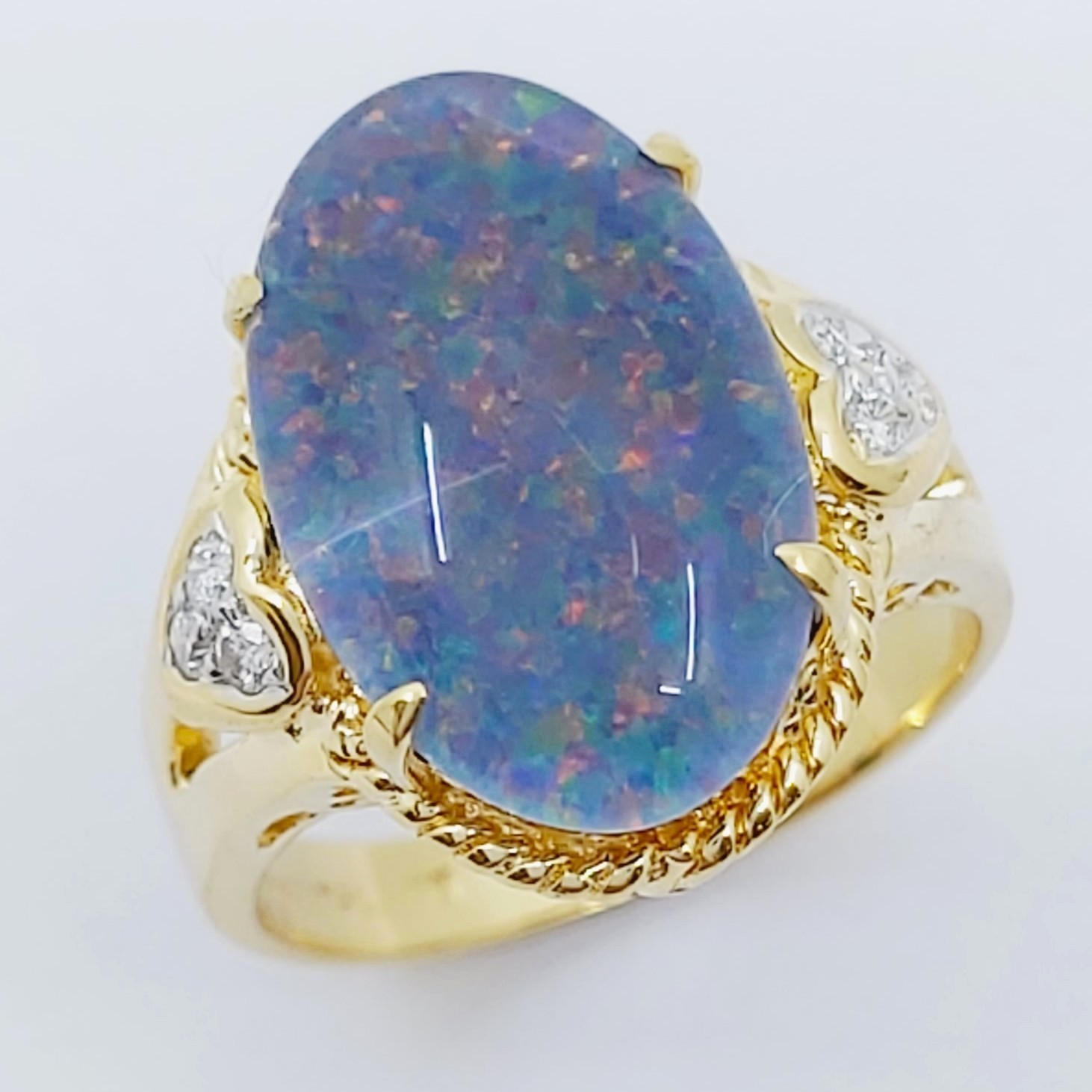 Ring 750/- mit einer Opal-Triplette und Brillanten, Größe: 51, 6,350g