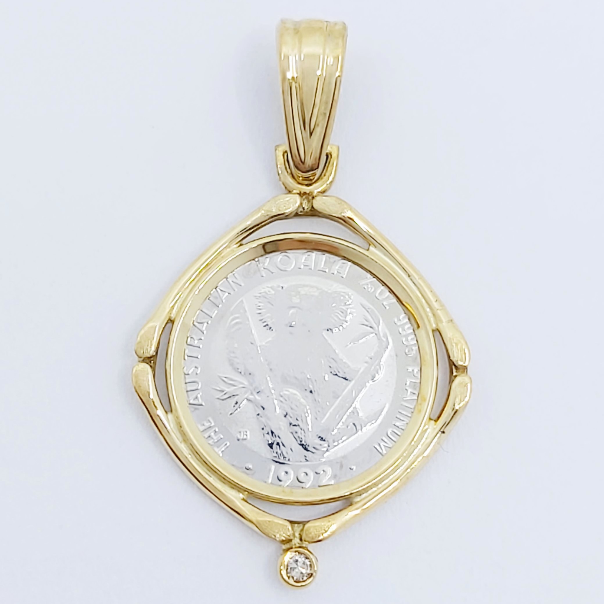 Anhänger 750/- mit 1/20oz 999/- Pt Münze mit einem Diamanten,  3,56g
