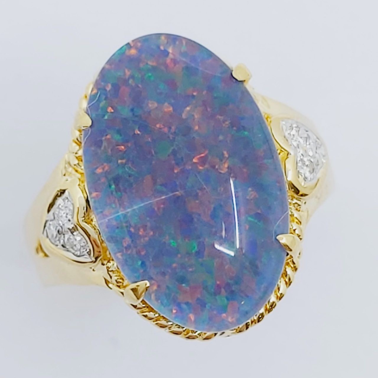Ring 750/- mit einer Opal-Triplette und Brillanten, Größe: 51, 6,350g