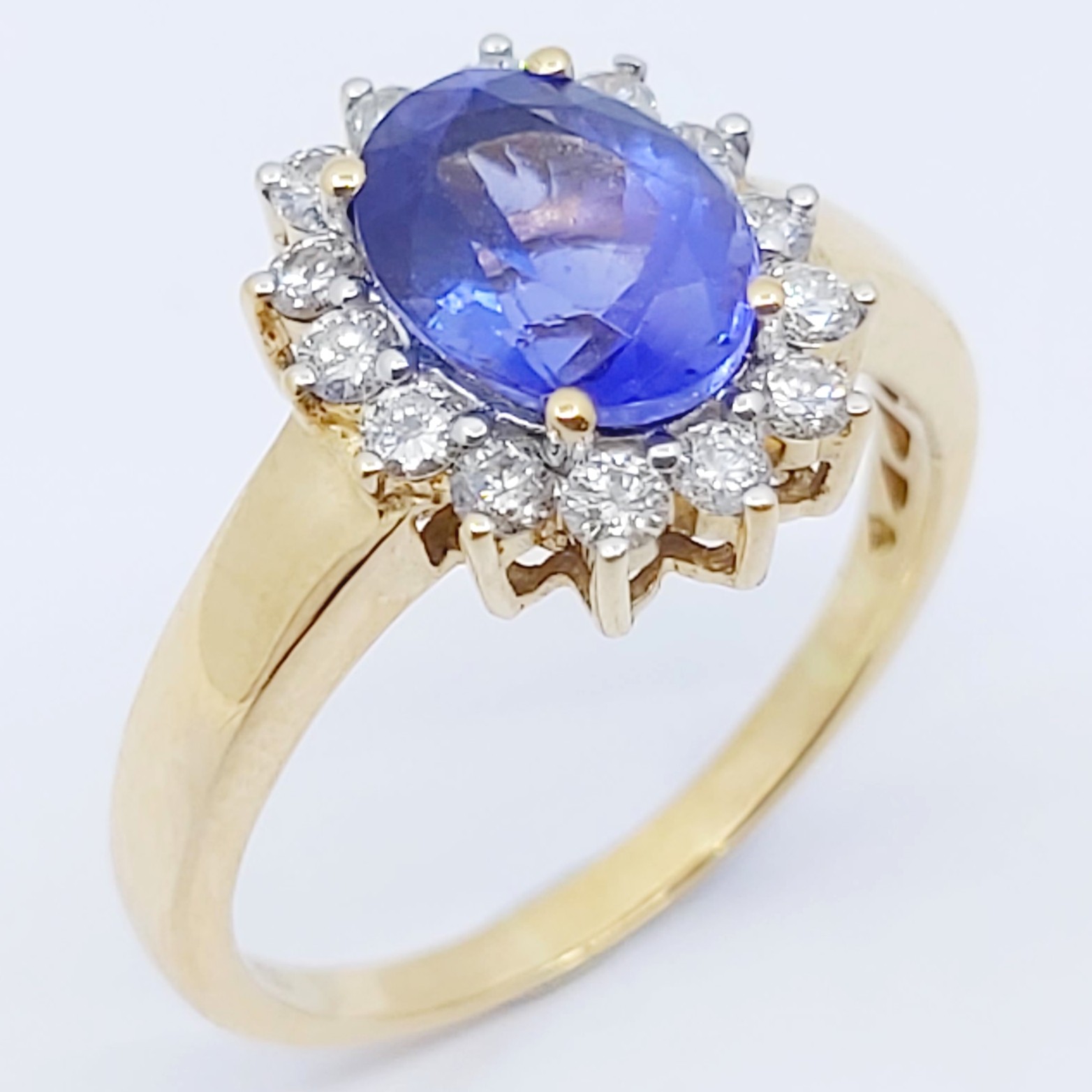 Ring 750/- mit einem Tansanit und Brillanten, Größe: 58, 4,94g