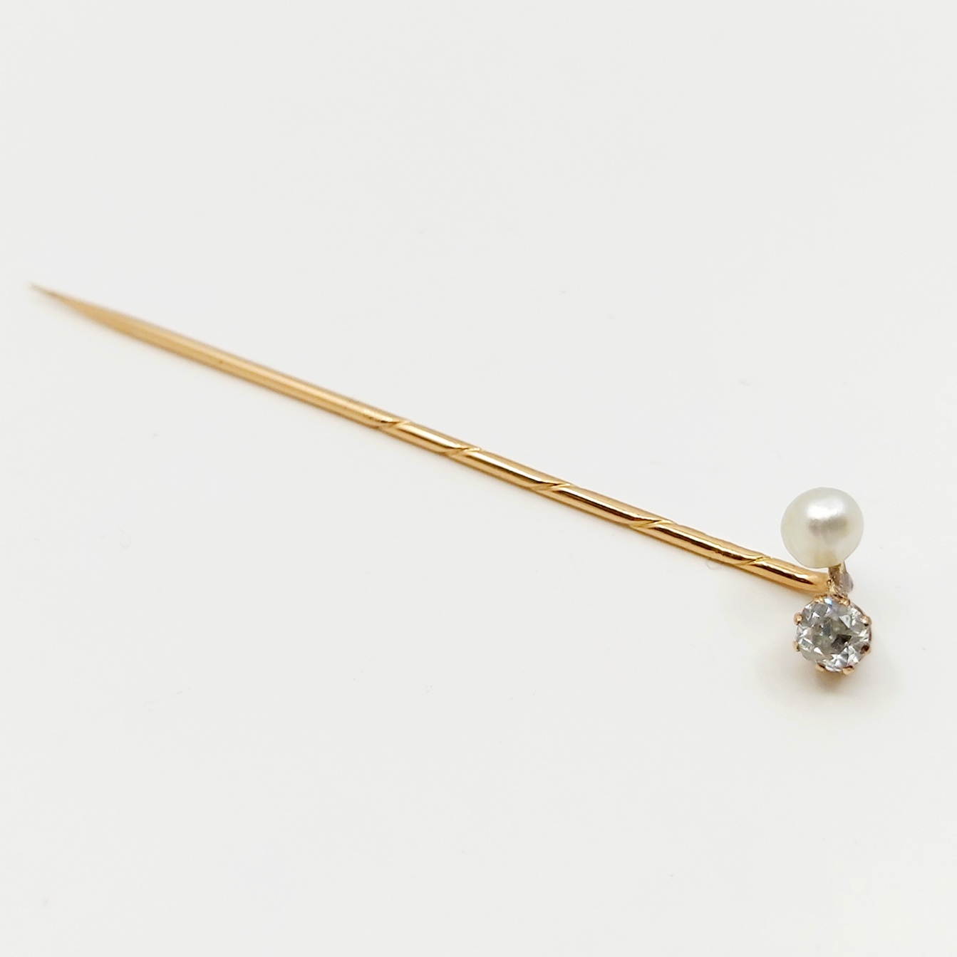 1 Anstecknadel 585/- mit Altschliff-Diamant und Perle, 1,94g