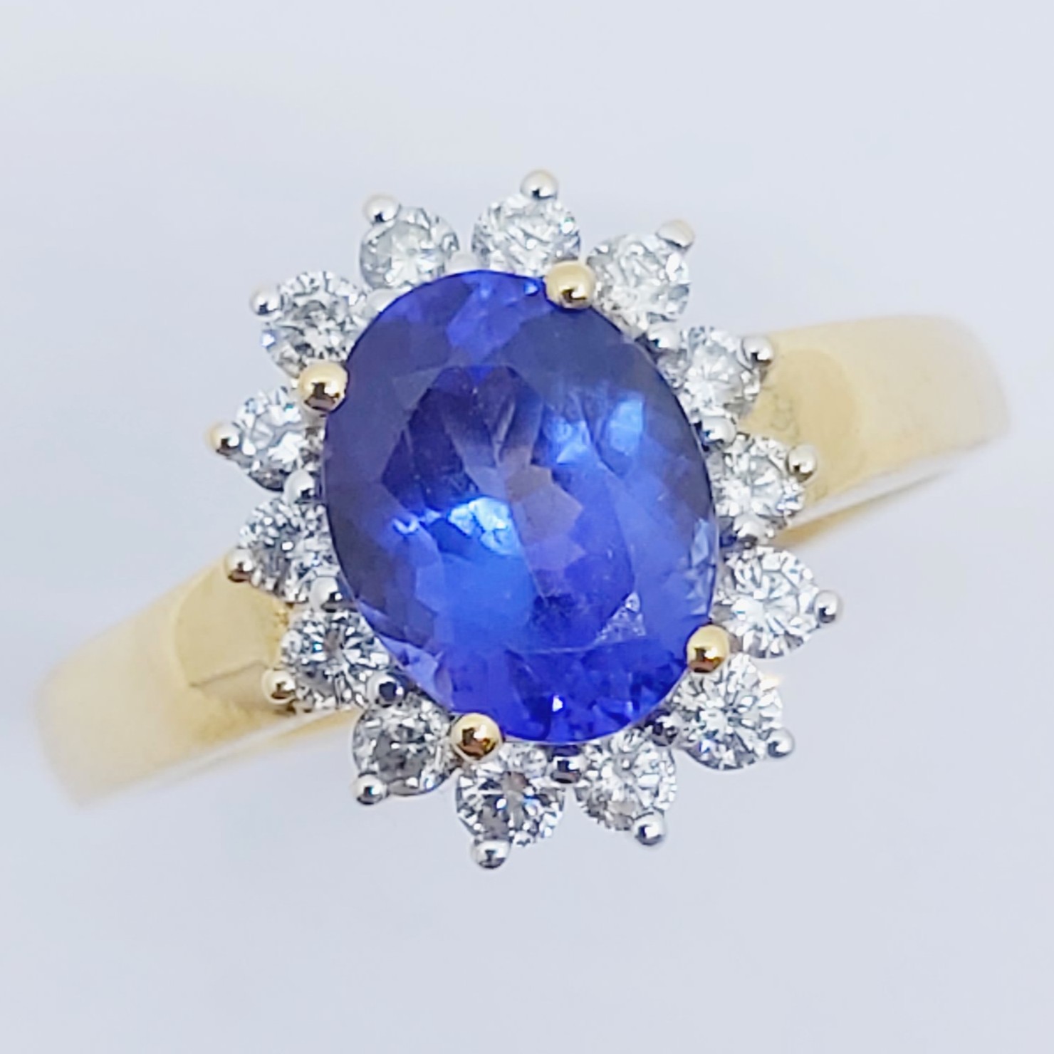 Ring 750/- mit einem Tansanit und Brillanten, Größe: 58, 4,94g