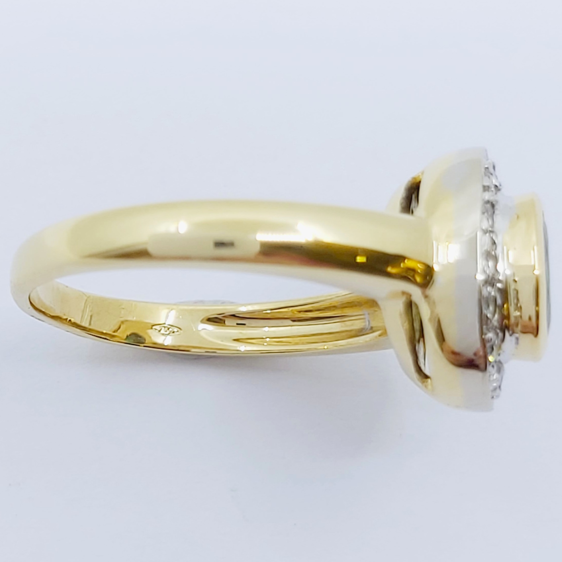 Ring 750/- mit einem Smaragd und Brillanten, Größe: 58, 7,61g